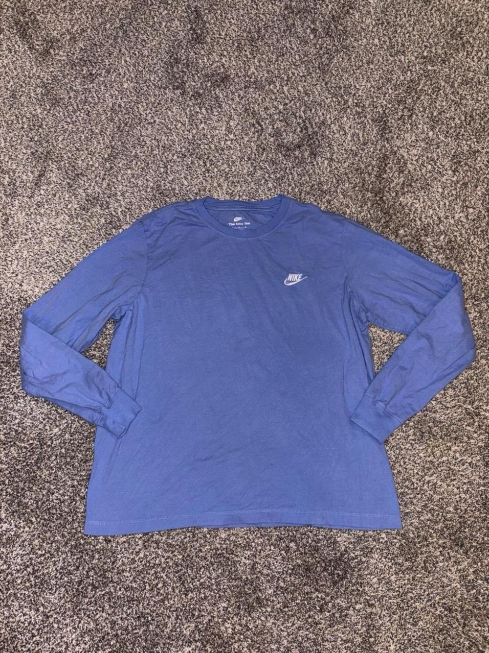 Light blue Nike long sleeve shirt with embroidered design